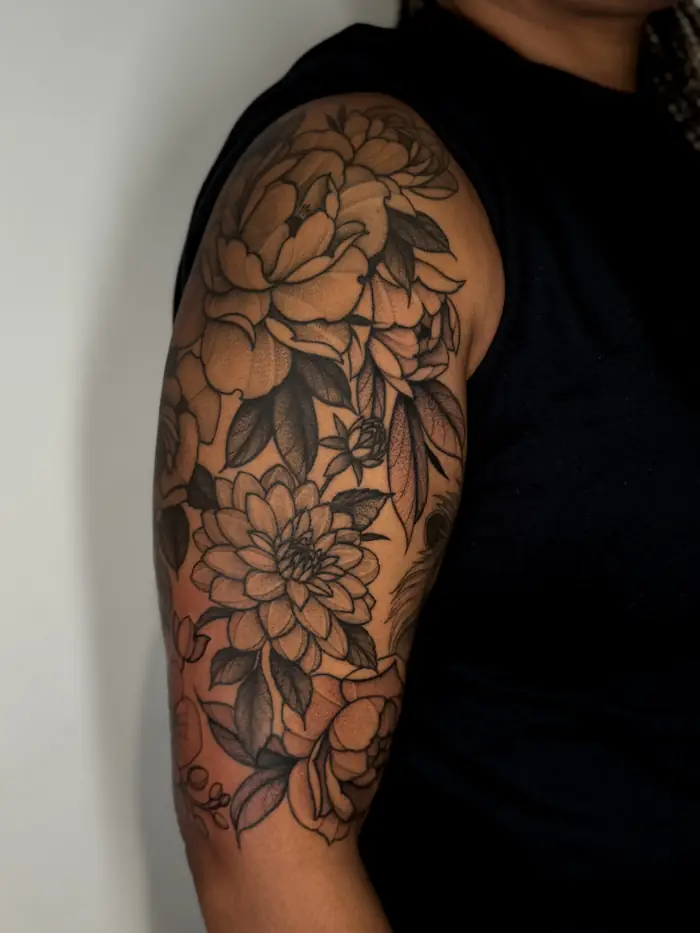 Floral half sleeve with dahlias