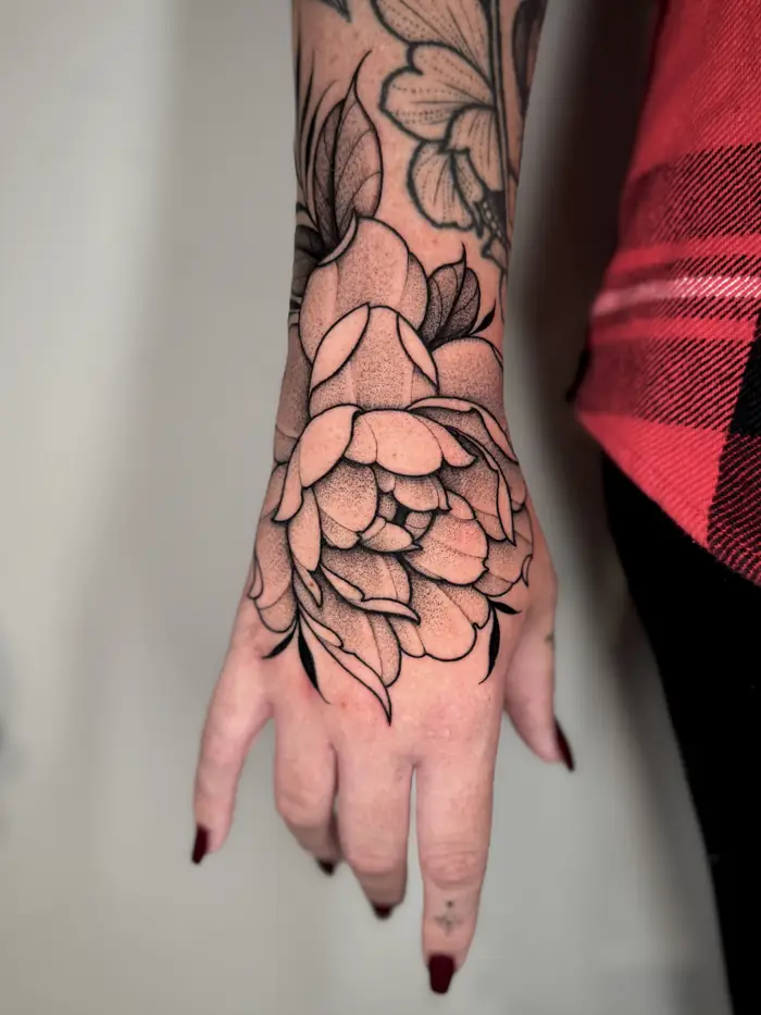 Peony on the back of the hand