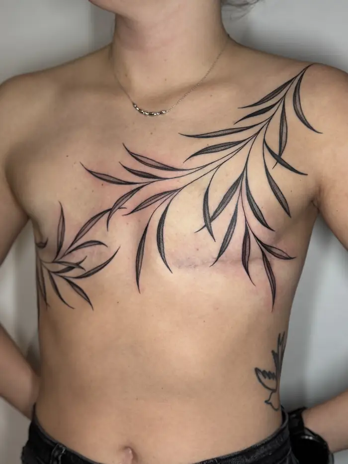 Leafy branches across the chest